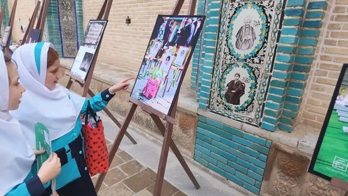 نمایشگاه عکس شهدای مدرسه میناب در تکیه معاون‌الملک کرمانشاه برپا شد