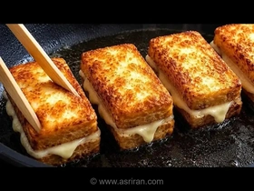طرز تهیه یک صبحانه فوری و لذیذ؛ نان تست با ژامبون و پنیر در خمیر تخم‌مرغی