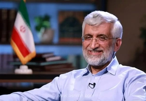 تصویر جلیلی با چتر در مزارستان؛ سوژه شبکه‌های اجتماعی
