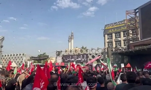 قاب هوایی از بدرقه پیکر رهبر شهید توسط مردم در خیابان آزادی