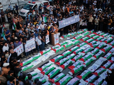 فلسطینیان در غزه پیکر 100 قربانی زیر آوار را به خاک می‌سپارند