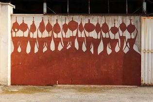 گالری جدید بنکسی ایران/ گزارشی از نقاشی‌های «میرزا حمید» در بناهای جنگ‌زده شهر